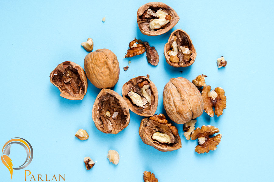 nuts walnuts blue background